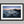 Ethereal Dawn coastal wall art featuring Northumbrian castle ruins, rocky shoreline and calm sea at sunrise