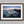 Ethereal Dawn coastal wall art featuring Northumbrian castle ruins, rocky shoreline and calm sea at sunrise