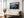 Ethereal Dawn coastal wall art featuring Northumbrian castle ruins, rocky shoreline and calm sea at sunrise