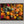 Woodland Mosaic shown in a walnut frame without a border or mount.