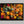 Woodland Mosaic shown in a black frame without a border or mount.