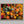 Woodland Mosaic shown in an oak frame without a border or mount.