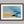 Abstract coastal artwork with layered blue waves, textured ivory forms and a warm golden shoreline.