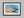 Abstract coastal artwork with layered blue waves, textured ivory forms and a warm golden shoreline.