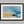Abstract coastal artwork with layered blue waves, textured ivory forms and a warm golden shoreline.