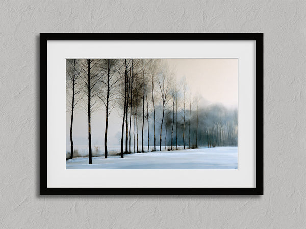 Bare winter trees fading into blue-grey mist across a quiet snow-covered landscape.
