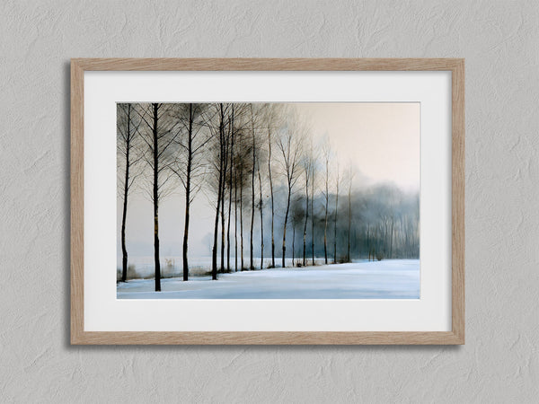 Bare winter trees fading into blue-grey mist across a quiet snow-covered landscape.