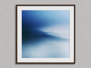 Blue Meridian shown in a walnut frame with a white border or mount.