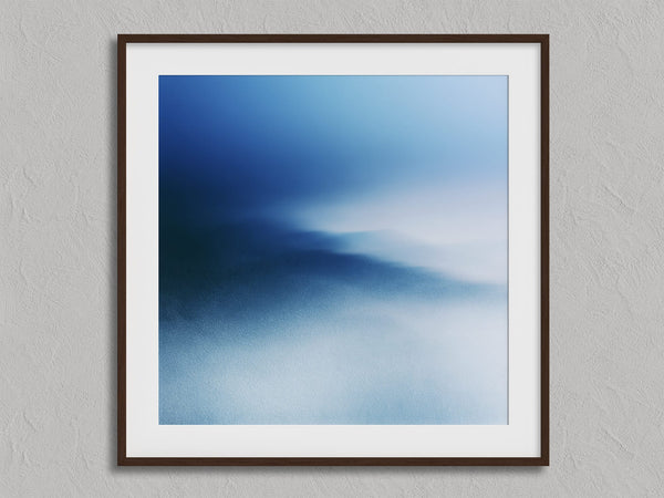 Blue Meridian shown in a walnut frame with a white border or mount.