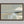 Pale Estuary shown in a walnut frame without a border or mount.