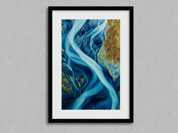 Arctic Threads shown in a black frame with a white border or mount.