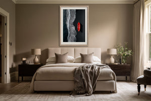 Light-framed aerial shoreline artwork with a red rowing boat above a bed.