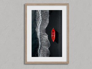 Red Shoreline shown in an oak frame with a white border or mount.