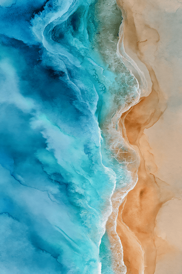 Aerial view of turquoise ocean waves meeting a warm sandy beach