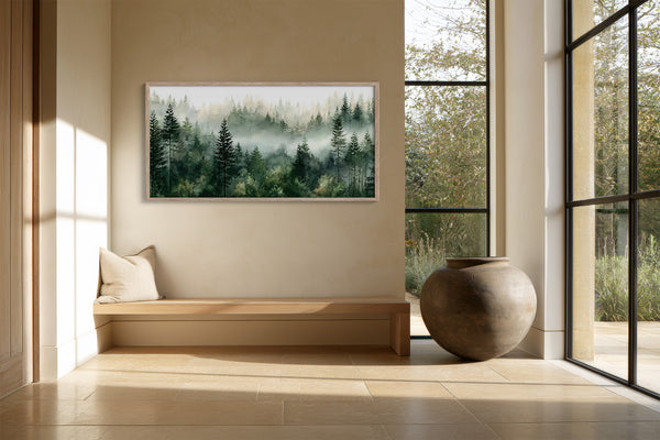 Misty pine forest watercolor in a light wood frame above a built-in bench and ceramic vessel.