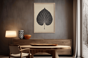 Framed botanical wall art print styled in a calm neutral interior