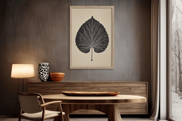 Framed botanical print of a single aspen leaf in fine line art. Minimalist, organic wall decor with timeless natural elegance.