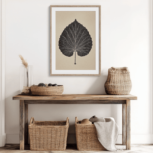 Framed botanical print of a single aspen leaf in fine line art. Minimalist, organic wall decor with timeless natural elegance.