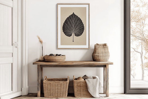 Framed botanical print of a single aspen leaf in fine line art. Minimalist, organic wall decor with timeless natural elegance.
