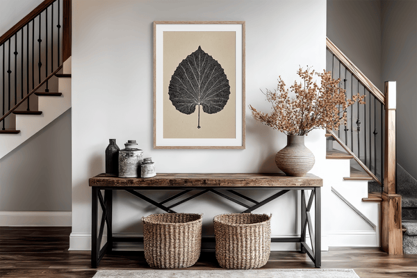 Framed botanical print of a single aspen leaf in fine line art. Minimalist, organic wall decor with timeless natural elegance.
