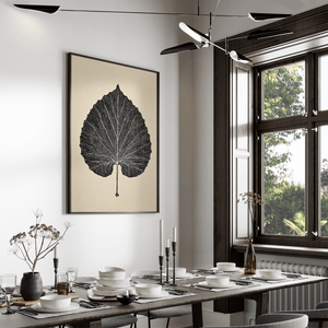 Framed botanical wall art print styled in a calm neutral interior