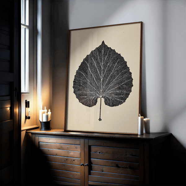 Framed botanical print of a single aspen leaf in fine line art. Minimalist, organic wall decor with timeless natural elegance.