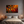 Canvas wall art of an autumn forest from above in crimson, gold, and flame hues. A vibrant seasonal landscape print. Ready to hang.