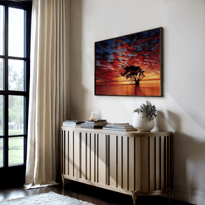 Ocean sunrise wall art print styled in a calm neutral interior