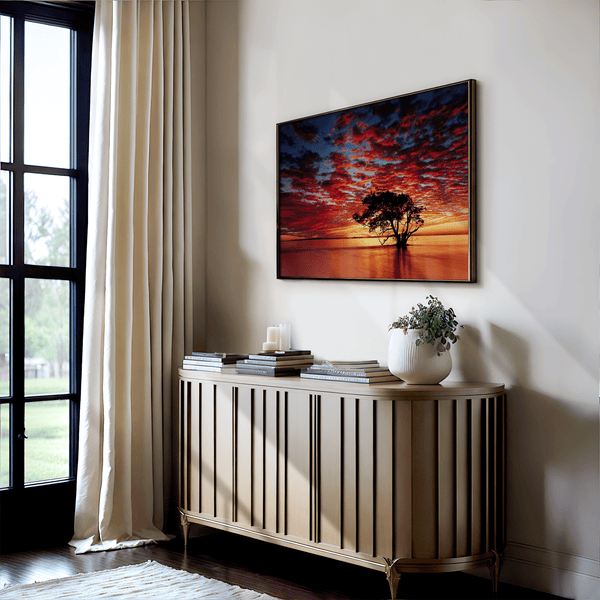 Framed wall art of a solitary ocean tree at sunrise. A serene fine art print capturing dawn’s quiet light over sea and sky.