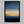Framed wall art of an abstract seascape in deep indigo, blue, and gold. A minimalist horizon print evoking calm and renewal.