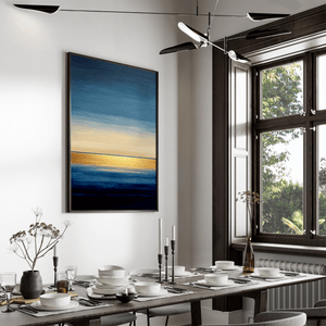 Framed abstract seascape wall art print in blue and gold tones