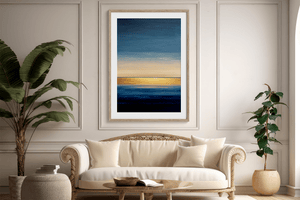 Framed abstract seascape wall art print in blue and gold tones
