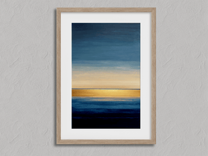 Framed abstract seascape wall art print in blue and gold tones