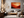 Warm desert sunset wall art styled in a calm neutral interior
