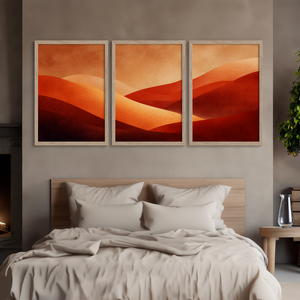 Framed desert sunset triptych wall art in warm red and amber tones. A soft, minimalist watercolour print that brings warmth and calm.