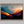 Framed wall art of layered mountains in twilight tones. Deep blues and sienna hues bring bold calm.