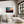 Framed wall art of layered mountains in twilight tones. Deep blues and sienna hues bring bold calm.