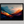 Framed wall art of layered mountains in twilight tones. Deep blues and sienna hues bring bold calm.
