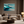 Framed wall art of abstract ocean waves in deep indigo, teal, and white. A calming coastal piece that’s ready to hang.
