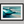 Framed wall art of abstract ocean waves in deep indigo, teal, and white. A calming coastal piece that’s ready to hang.