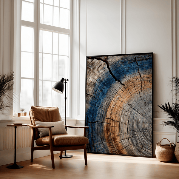 Framed fine art print of tree ring textures in warm browns and cool blues. A striking, timeless piece of nature-inspired wall art.