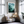 Framed wall art of a mystical mountain scene in emerald and teal hues. A tranquil, enchanting landscape print. Ready to hang.