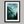 Framed wall art of a mystical mountain scene in emerald and teal hues. A tranquil, enchanting landscape print. Ready to hang.