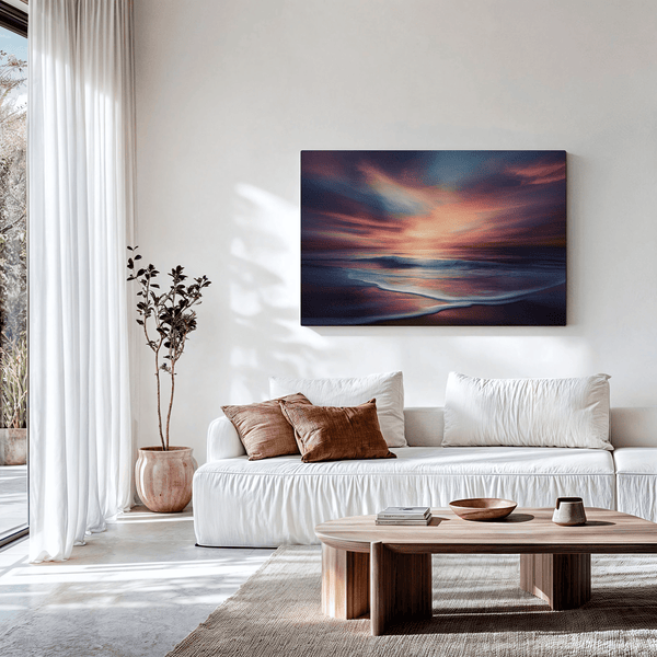 Canvas wall art of a tranquil beach at sunset in warm orange, pink, and purple tones. A calming golden hour print, ready to hang.