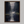 Framed wall art of a misty evergreen forest reflected on still waters. A serene, ethereal woodland print. Ready to hang.