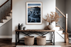 Dunstanburgh Castle sunrise wall art styled in a calm neutral interior