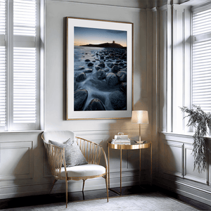 Dunstanburgh Castle sunrise wall art styled in a calm neutral interior