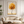 Framed wall art of a golden autumn tree in a minimalist cubist style. Soft, serene, and ready to hang.