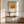 Framed wall art of a golden autumn tree in a minimalist cubist style. Soft, serene, and ready to hang.