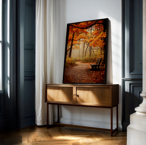 Framed wall art of a golden autumn forest path with light filtering through the trees. A serene woodland print. Ready to hang.